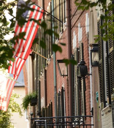 building facades with American flag in Old Town Alexandria Virginia 