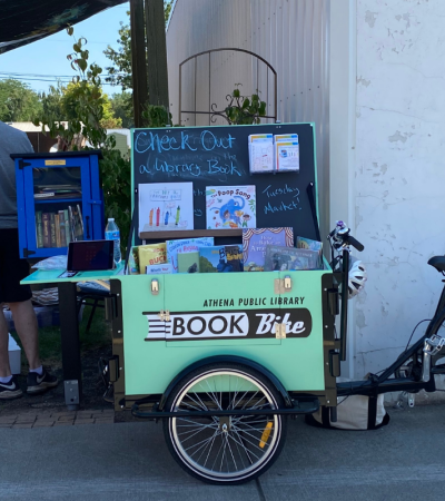 Photograph of the book bike at the Farmers Market