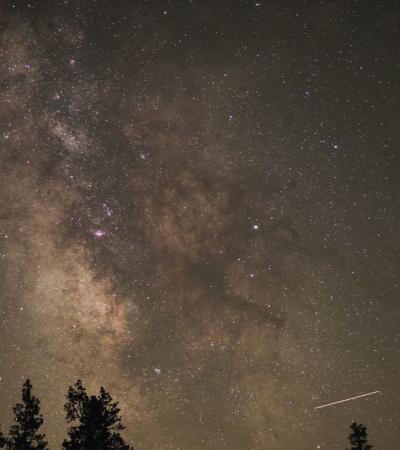 Photograph of night sky lit up with stars.