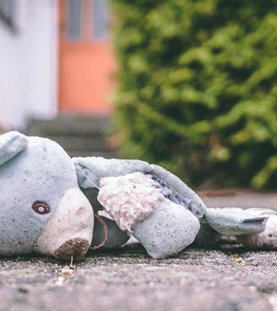 teddy bear on pavement