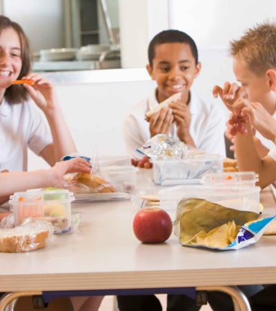 Students sitting around a lunch table