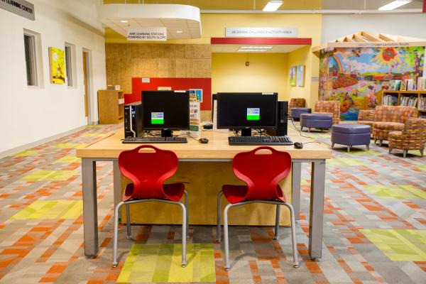 Photograph of computer lab set up in North Liberty Library, Iowa. 