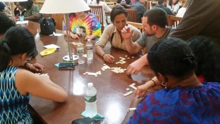 People playing a game in the library