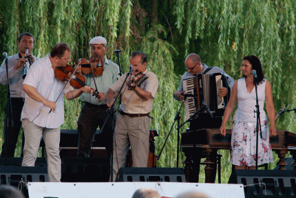 Performers play in the courtyard area