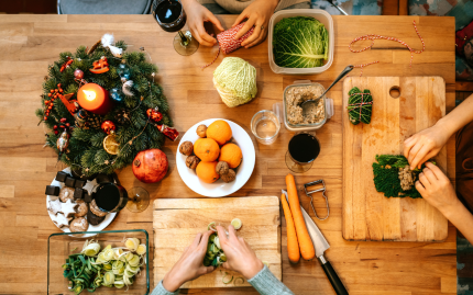 Photograph of a healthy holiday meal being prepared shot from above.