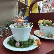 Photograph of two finished Teacup Fairy Gardens