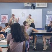 Photograph of librarians at a school visit.