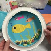 Aquarium plate with cereal