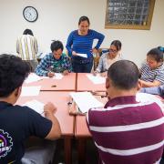 Nepali and Burmese-speaking patrons learn about financial literacy.