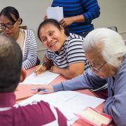 Nepali and Burmese-speaking patrons learn about financial literacy.