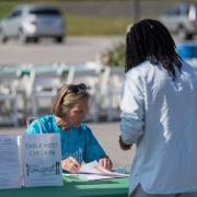 Table host checking in at beginning of event