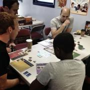 Participants playing a board game 