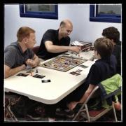 Participants playing a board game 