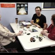 Participants playing a board game 