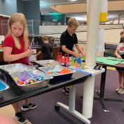 Photograph of children putting together their mini mini golfs