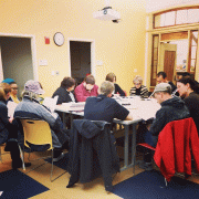 Next Chapter Book Club members gathered around table for discussion