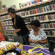 Women knitting the plarn