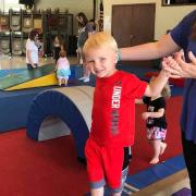 Child on a balance beam