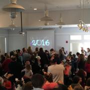 Participants looking at a screen with a New Year's countdown