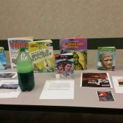 Books and a tornado in a bottle on display