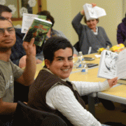 Participants show off their books at Next Chapter Book Club