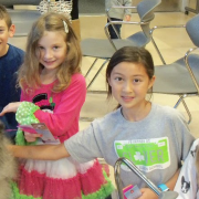 Group of children with fluffy dog