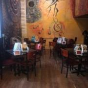 tables set up in dining area with books on them