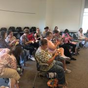 Rows of knitters at work