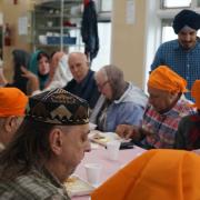 Attendees sharing dinner.