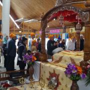 A group touring the Gurdwara. 