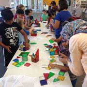 Group of children playing with Magna-Tiles