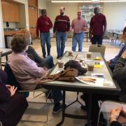 An a cappella group performs for the Memory Café.