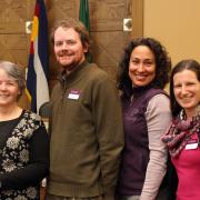 Library staff pose with speaker Elizabeth Skewes.