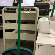 foam sphere decorated into piranha plant head and green pole sitting in planter pot