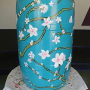 Teal Barrel w/White Flowers: Sean Davis, READ Center Supervisor, 2016