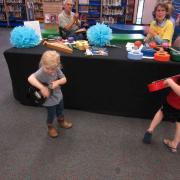 Playing with ukuleles at Wonder Time. 