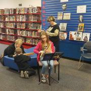 Participants playing with musical instruments at Wonder Time 