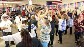 "Movement, Memories and Merengue" program, led by teaching artist Walter Perez, is part of Brooklyn Public Library's programming for older adults. Photo credit to Herb Scher.