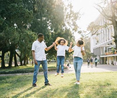 A family playing outdoors