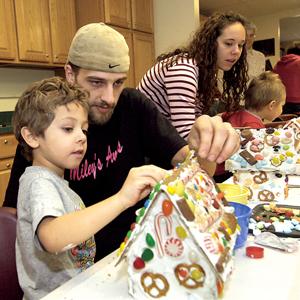 The community cleans out its cupboards to supply building materials for “gingerbread” houses.