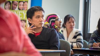 Photograph of people in a financial literacy class.