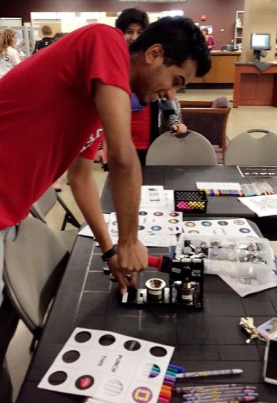 button-making in the library lobby