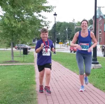 Photo by Jenn Carson. Multi-generations of the running club together. 