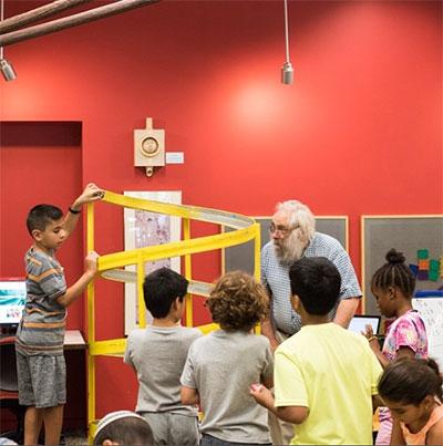 children participating in Meet at the Lodge at the Skokie Public Library